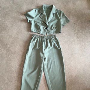 Green two-piece matching set: cropped short sleeve blazer & pants